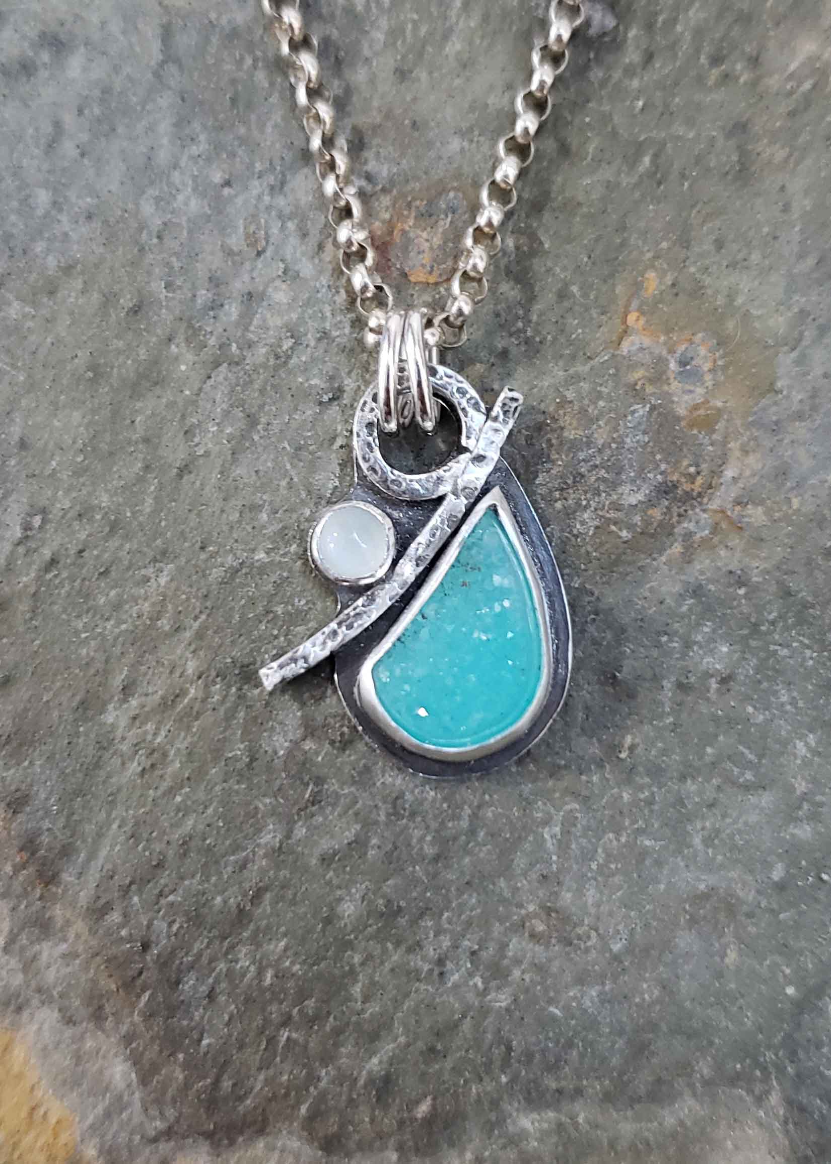 Sparkly turquois blue petite silver pendant by Dona Miller.