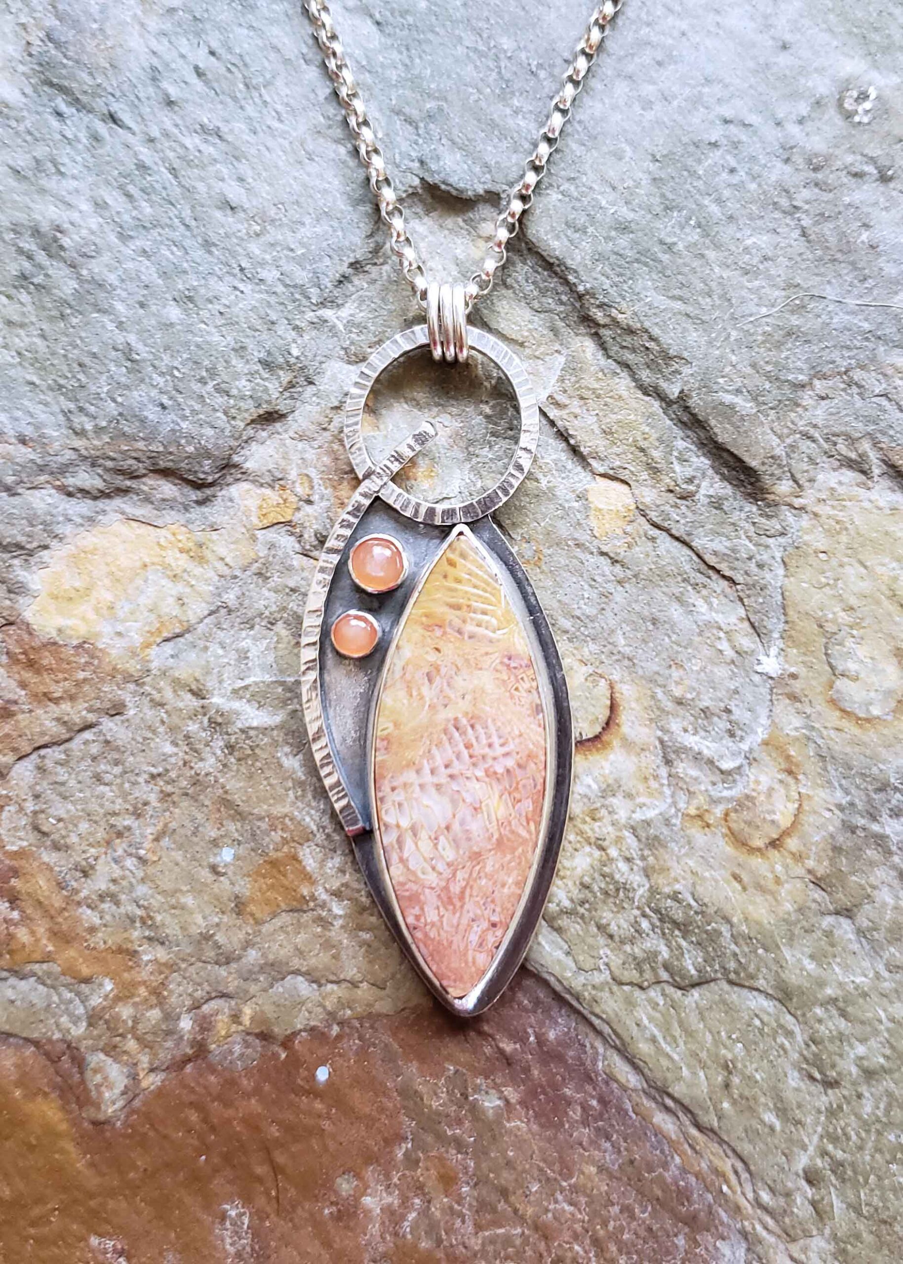 Silver pendant in peaches and cream by Dona Miller