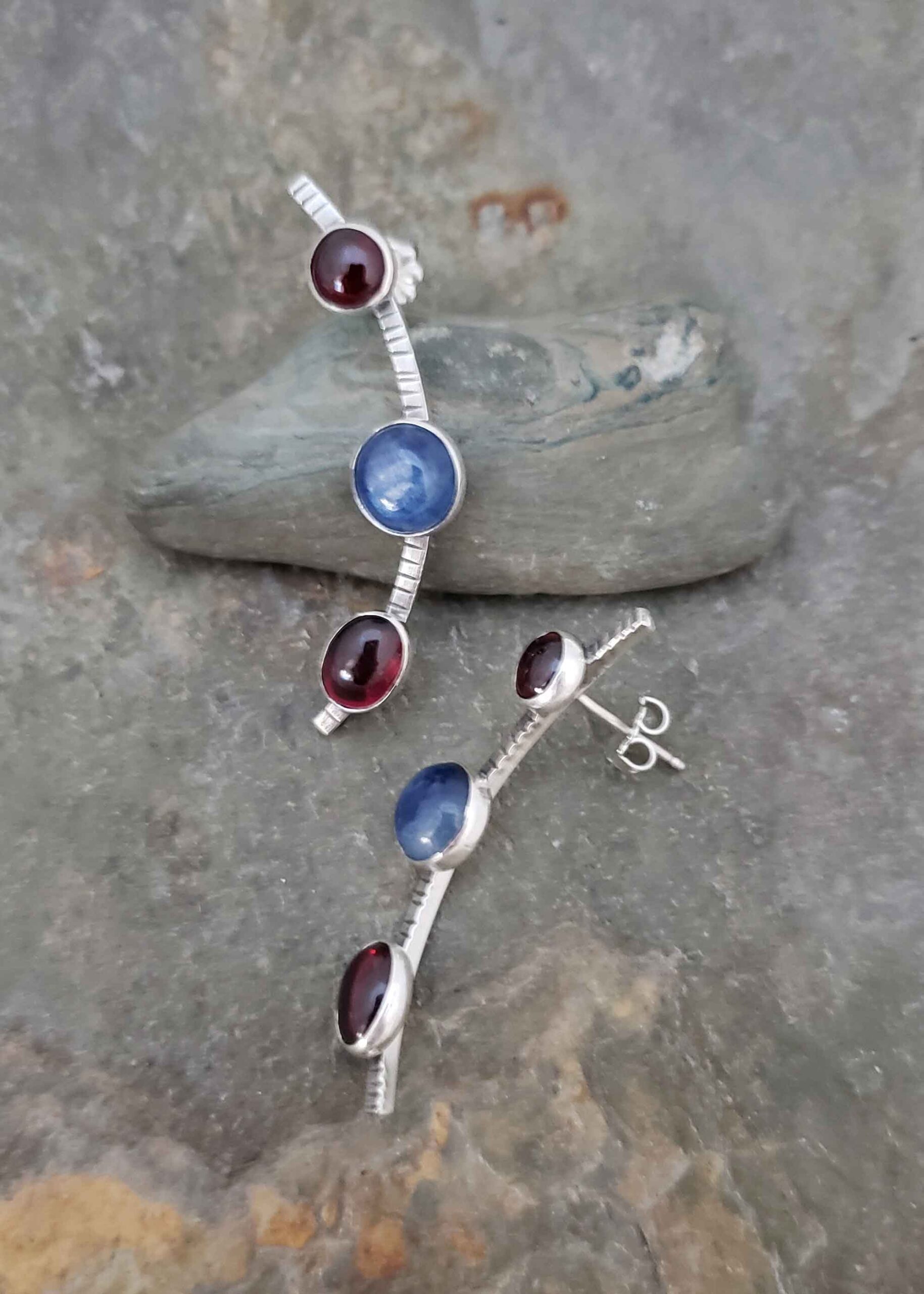 Three's a Charm blue Kyanite and red Garnet earrings.