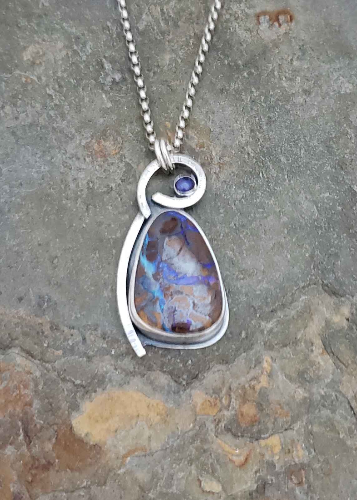 River's Bend - boulder opal and blue iolite silver pendant