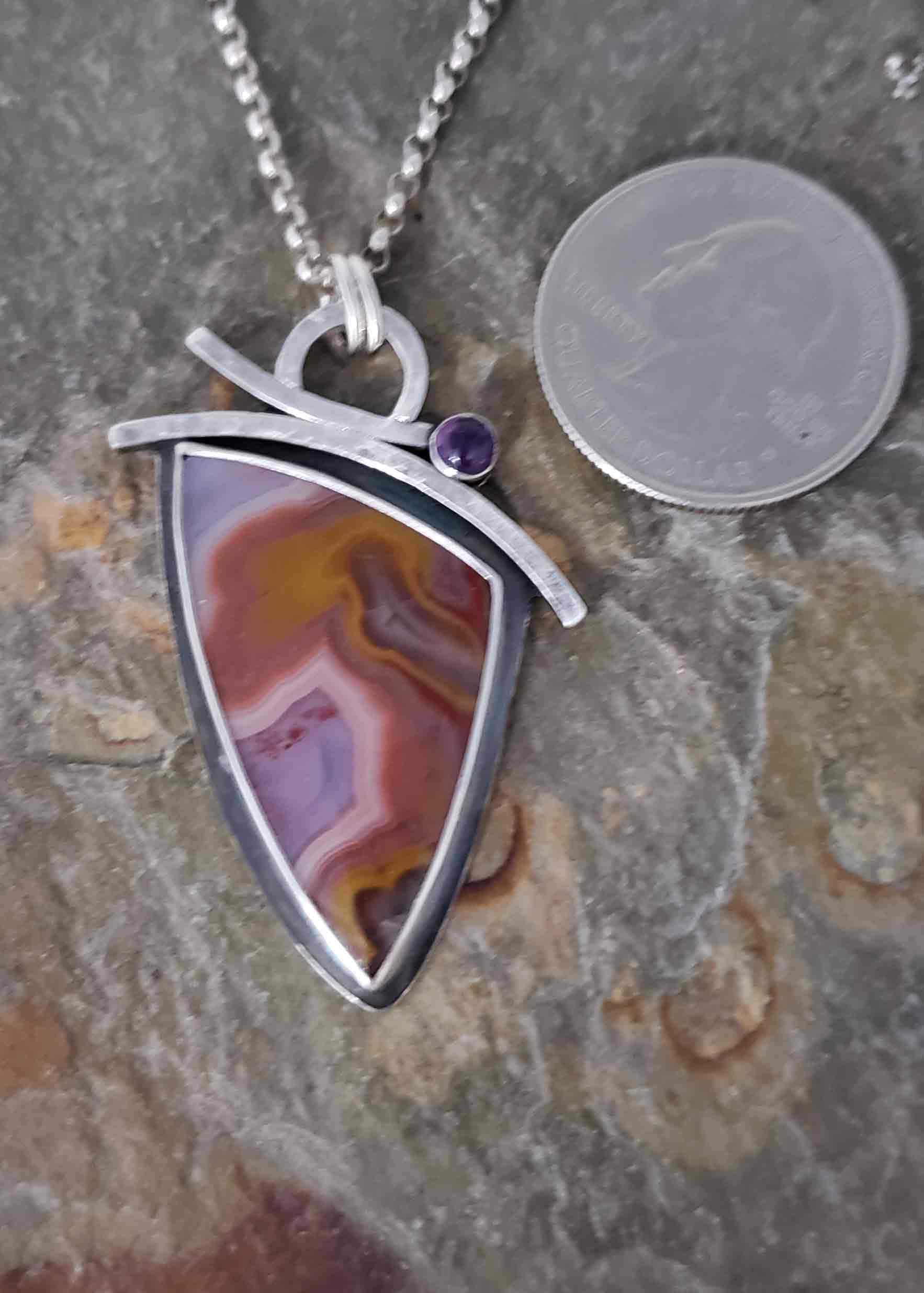 purples and rusts dominate this focal stone agua nueva, accented with amethyst.