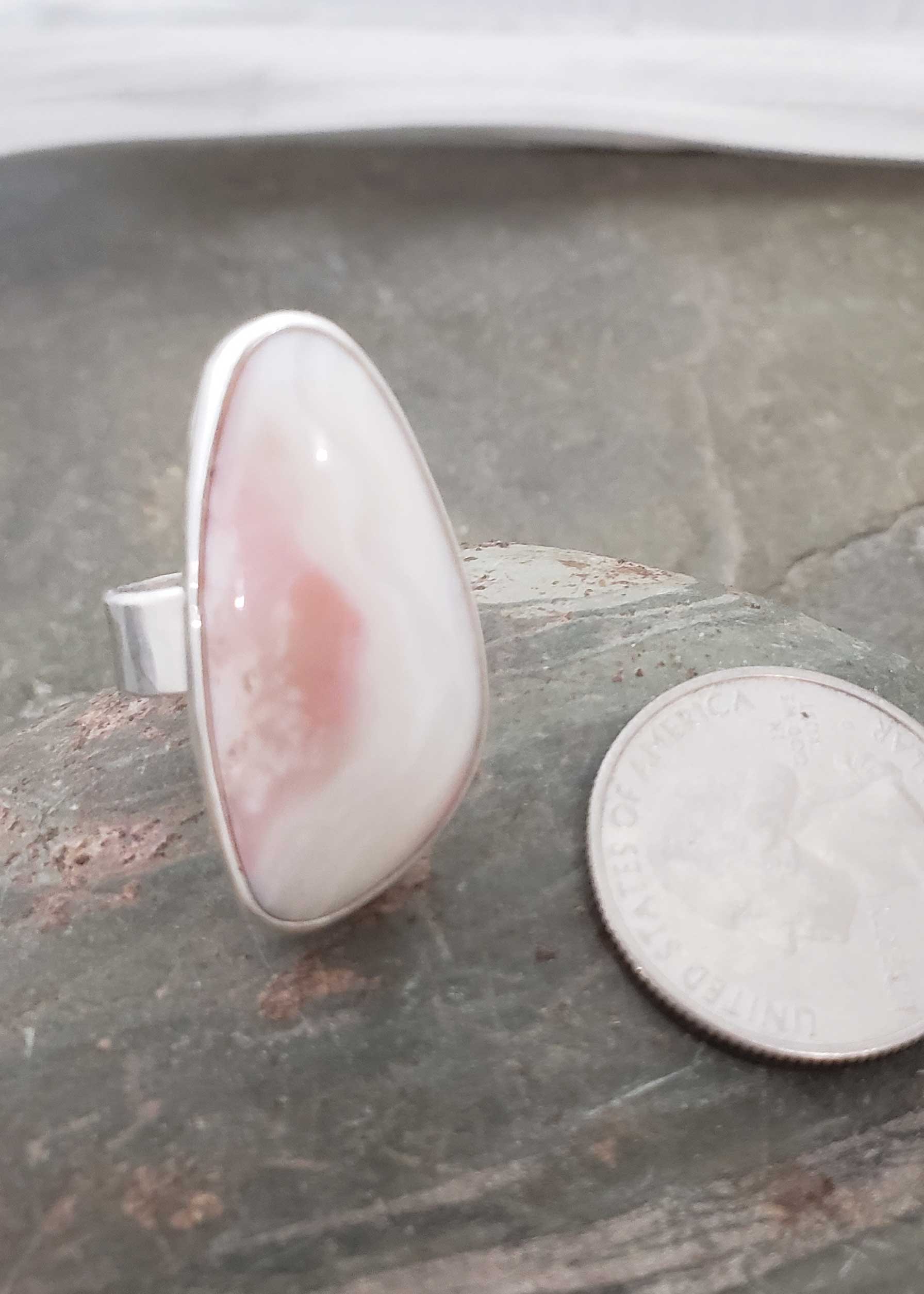 soft pinks in this statement ring of ice cream opal, size 7.5