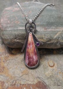 purples take center stage in this spiney oyster and amethyst silver pendant