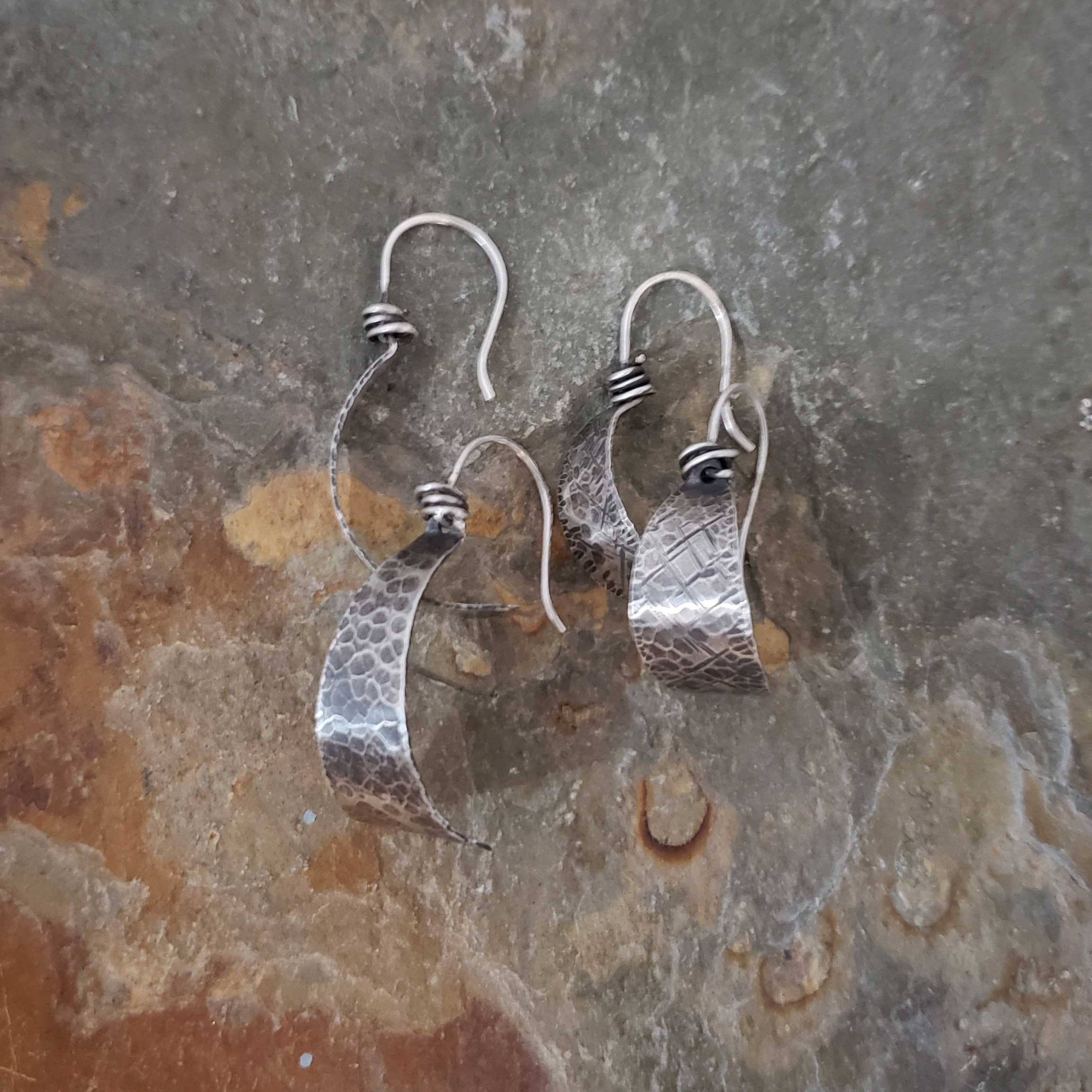 silver hoop statement earring example for class