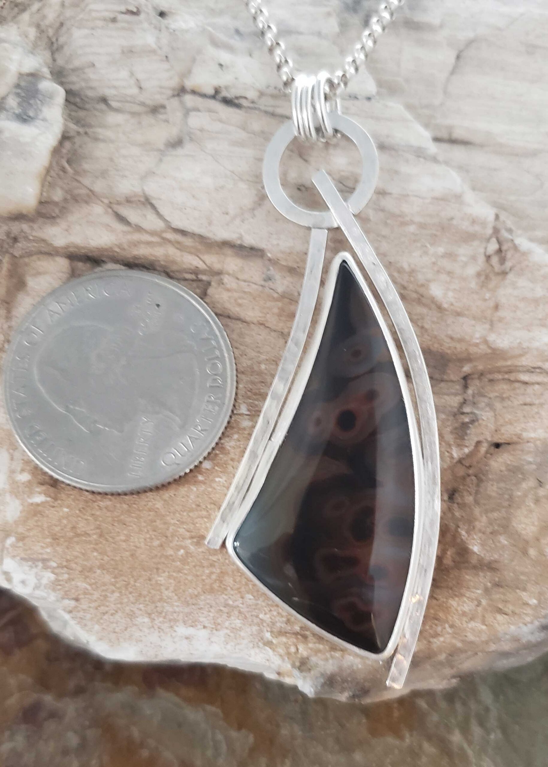 Golden Brown Brazilian Tube Agate in this Sail Silver Pendant by Dona Miller